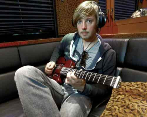 EG-1_PWTs_Dave_Tirio_EG1M_RED_5369cf80-3610-4d58-8a54-73d1677bc93e-Traveler Guitar®
