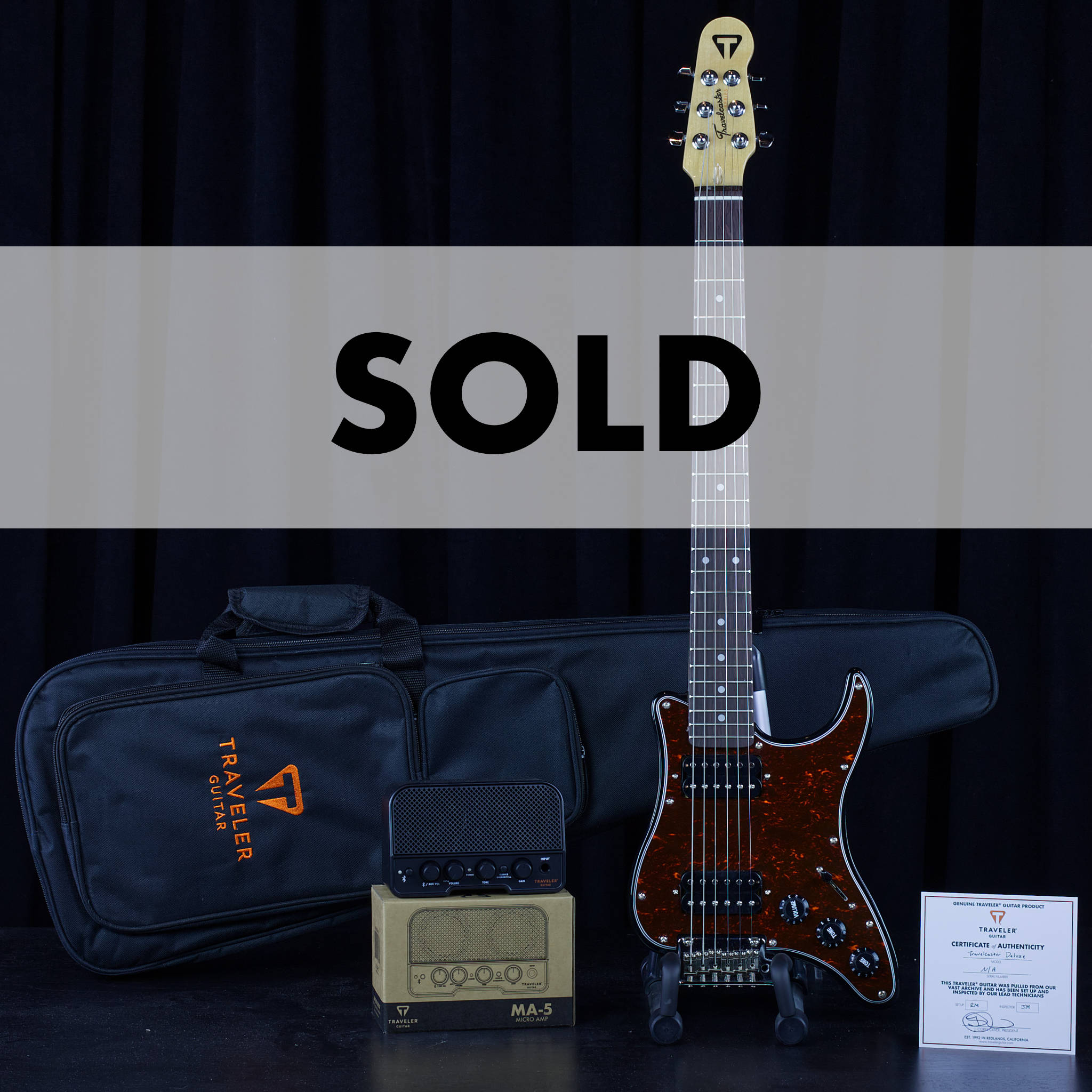 Travelcaster Deluxe (Gloss Black/ Tortoise)-Traveler Guitar®