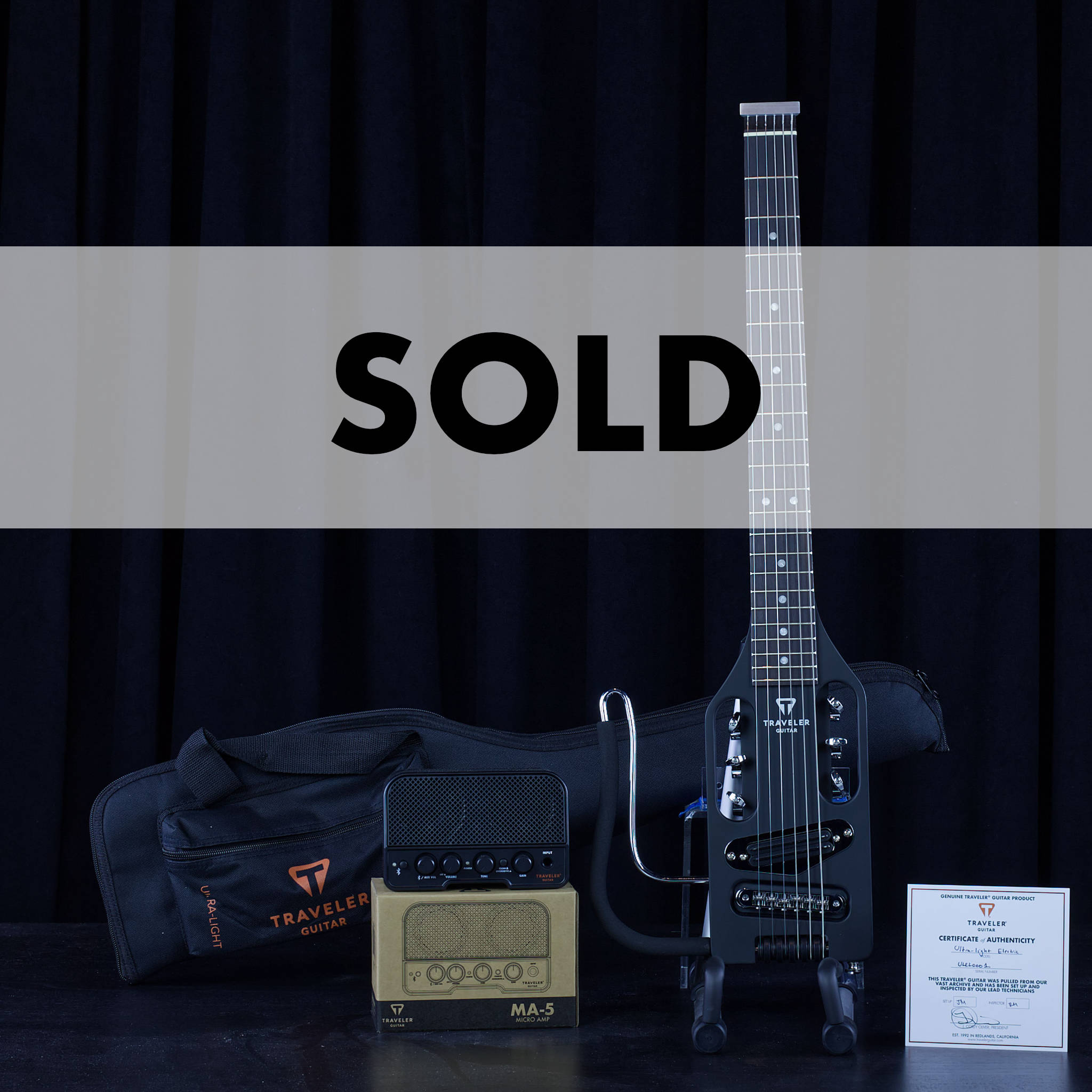 Ultra-Light Electric Left-Handed (Matte Black)-Traveler Guitar®