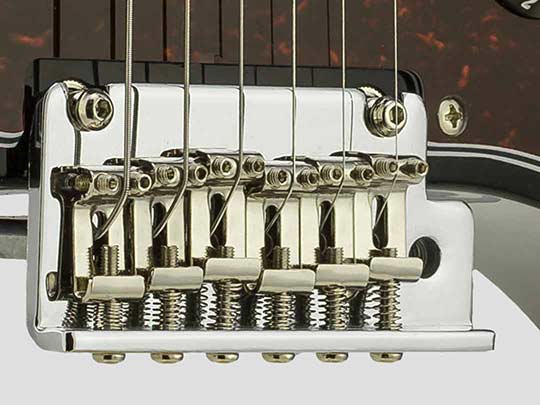 Travelcaster Deluxe guitars feature an adjustable 2-point tremolo with bent steel saddles
