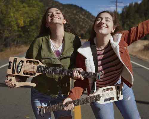 CARLY_MARTINA_TRAVELER_GUITAR-edit-Traveler Guitar®